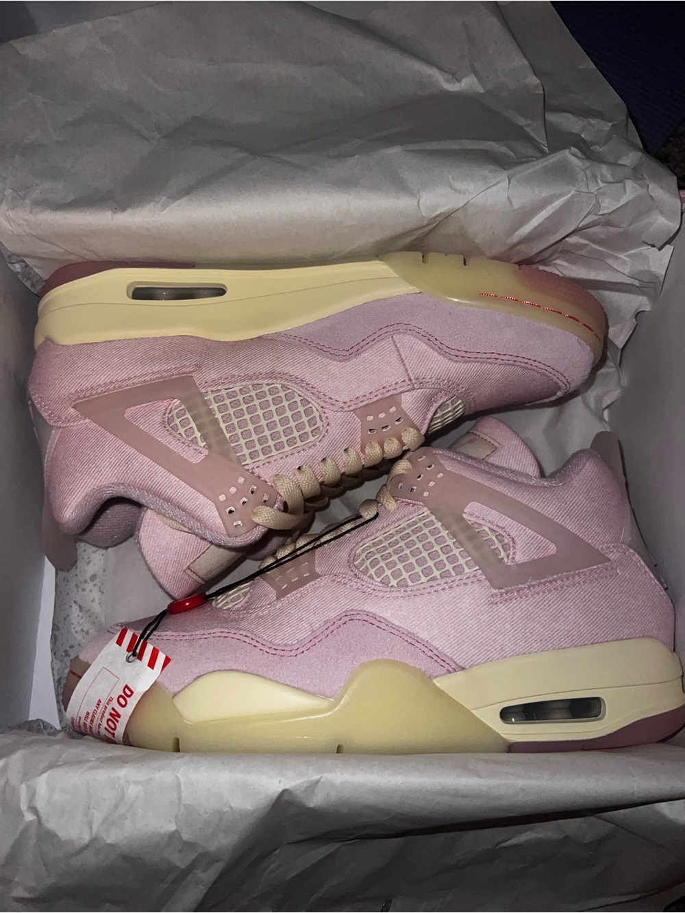 Jordan Retro 4’s Women’s Pink and Cream Retro Lace-Up Sneakers